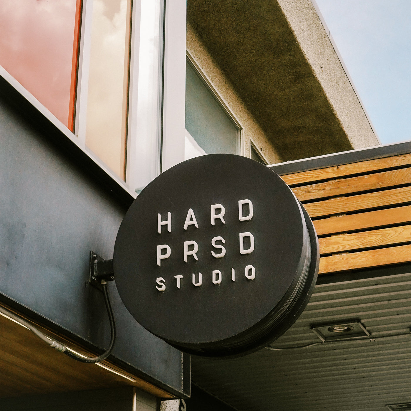 Hardpressed Studio storefront sign at 224 20th street in Riversdale, Saskatoon, Saskatchewan.